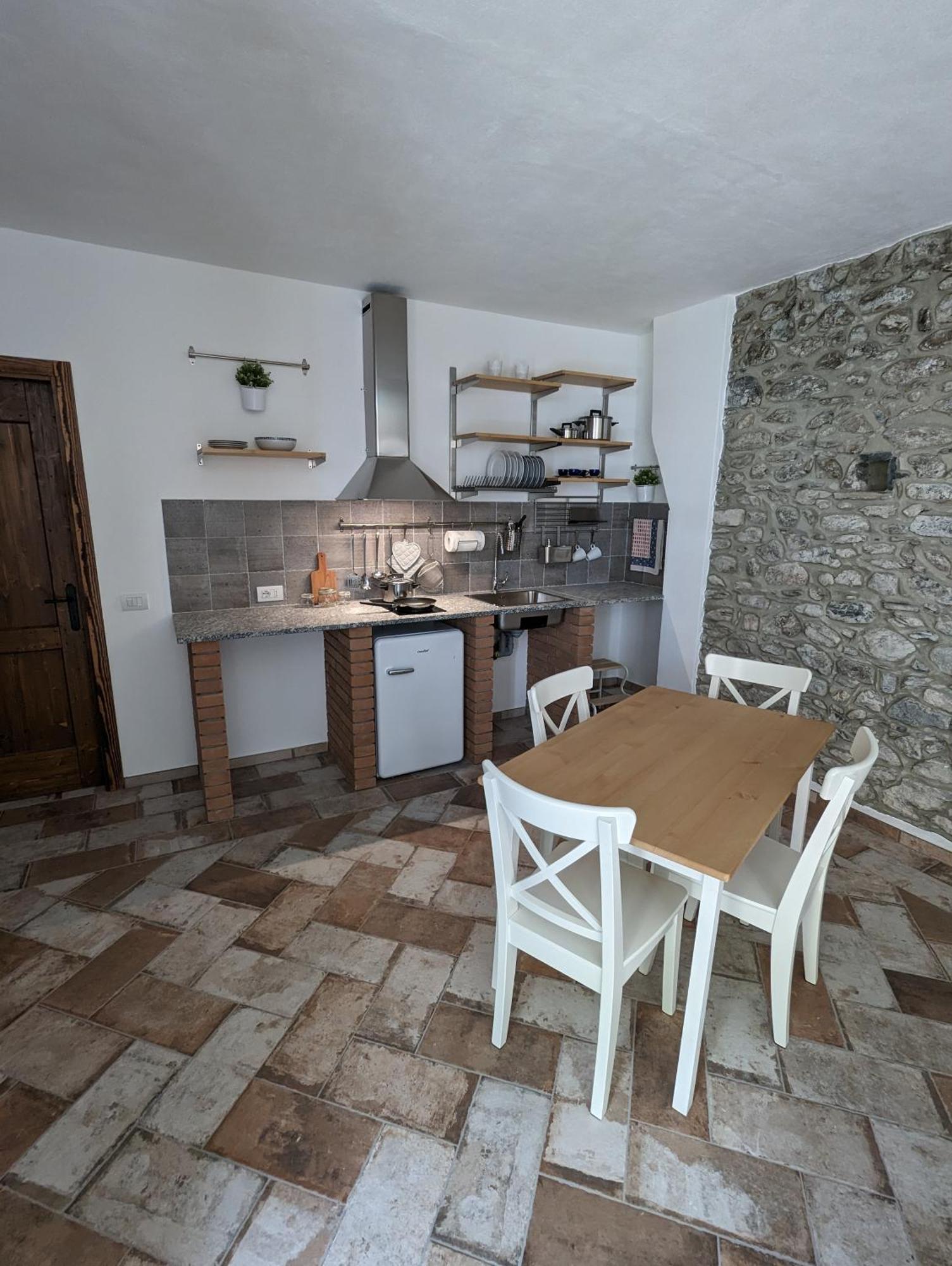 Antica Osteria Apartments Донго Стая снимка